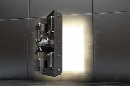 Puerta de caja de seguridad abierta Puerta de caja de seguridad abierta